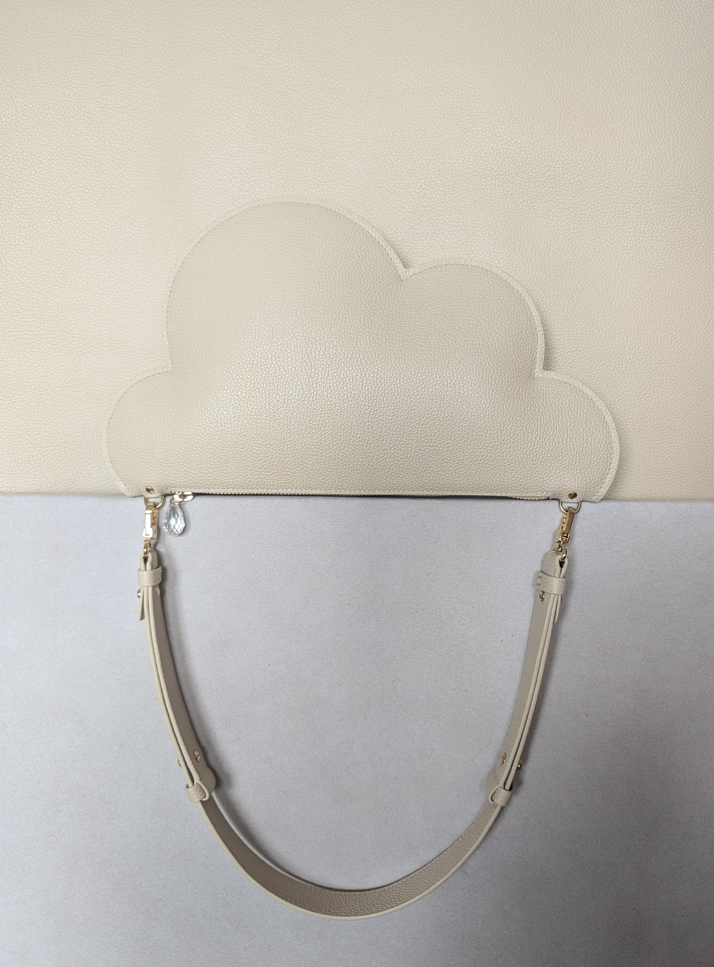 Clutch bag with removable strap in ivory