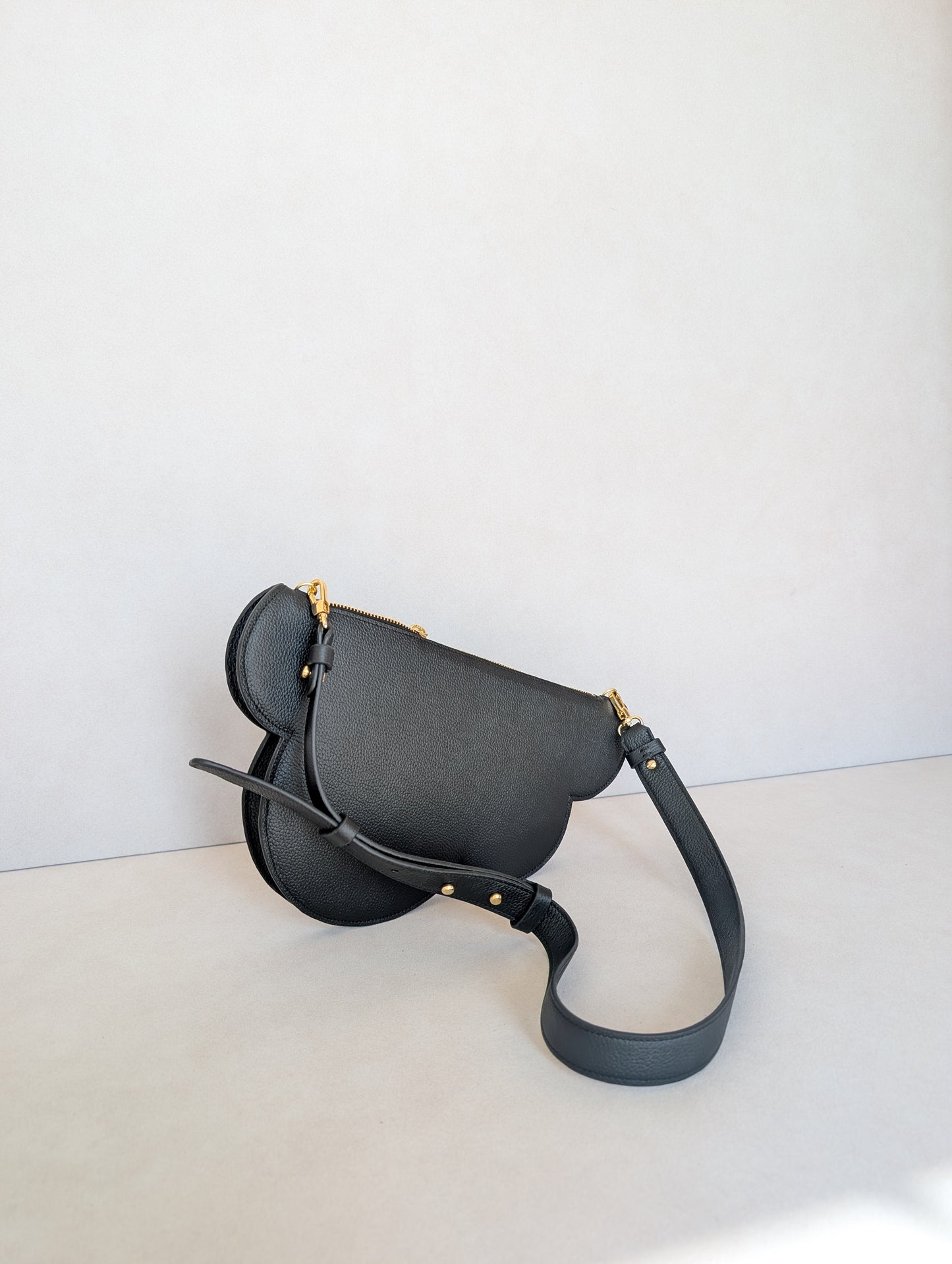 Clutch bag with removable strap in black with crystal studs