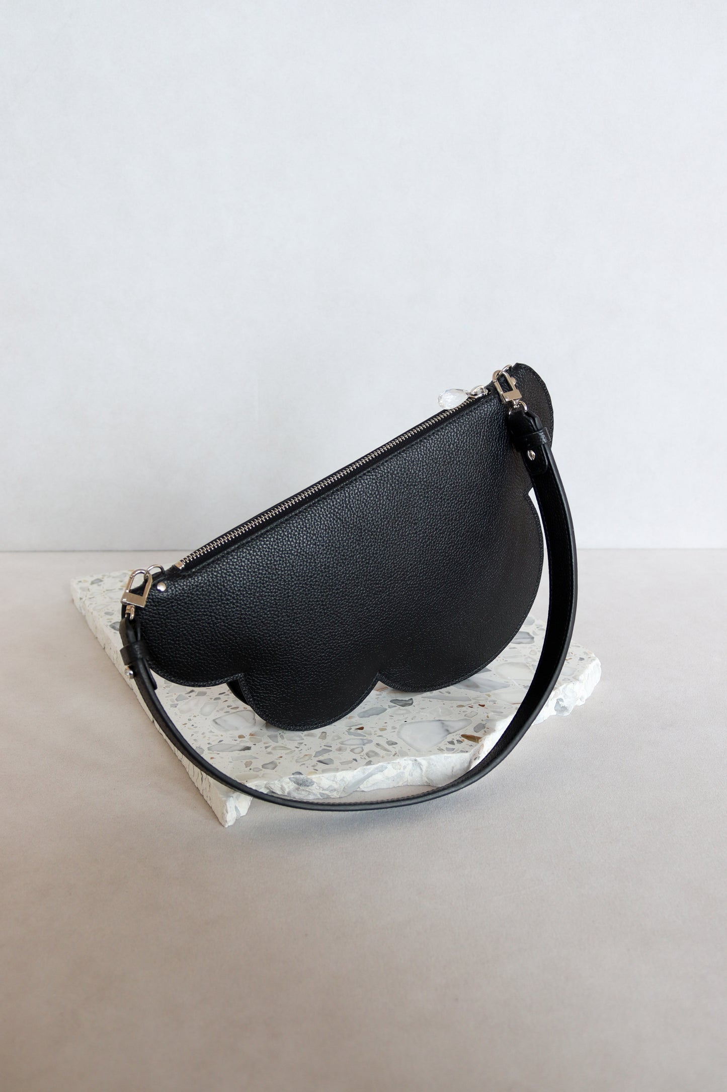 Clutch bag with removable strap in black with crystal studs