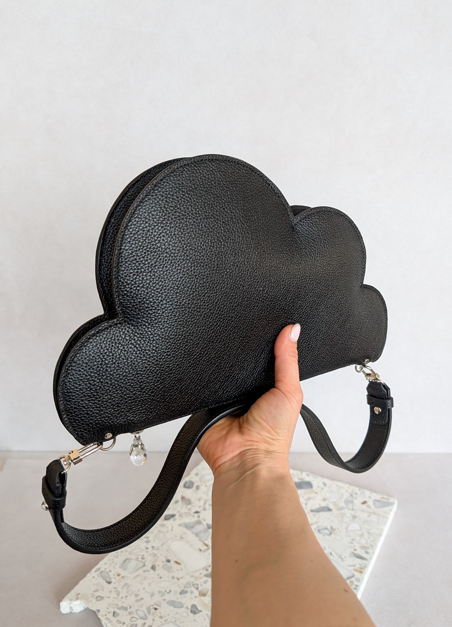 Clutch bag with removable strap in black with crystal studs