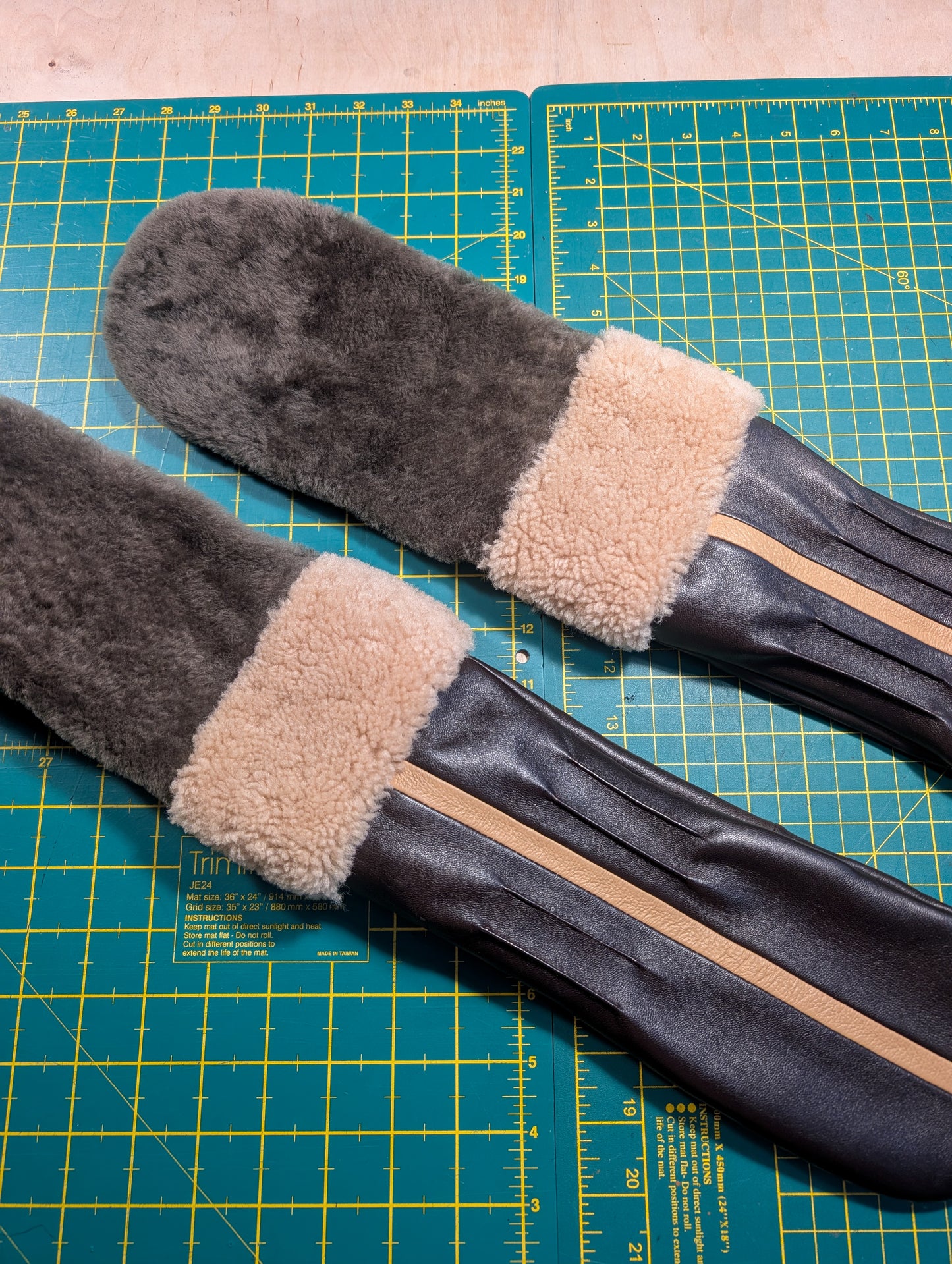 Merino lined mittens in chocolate brown and caramel.