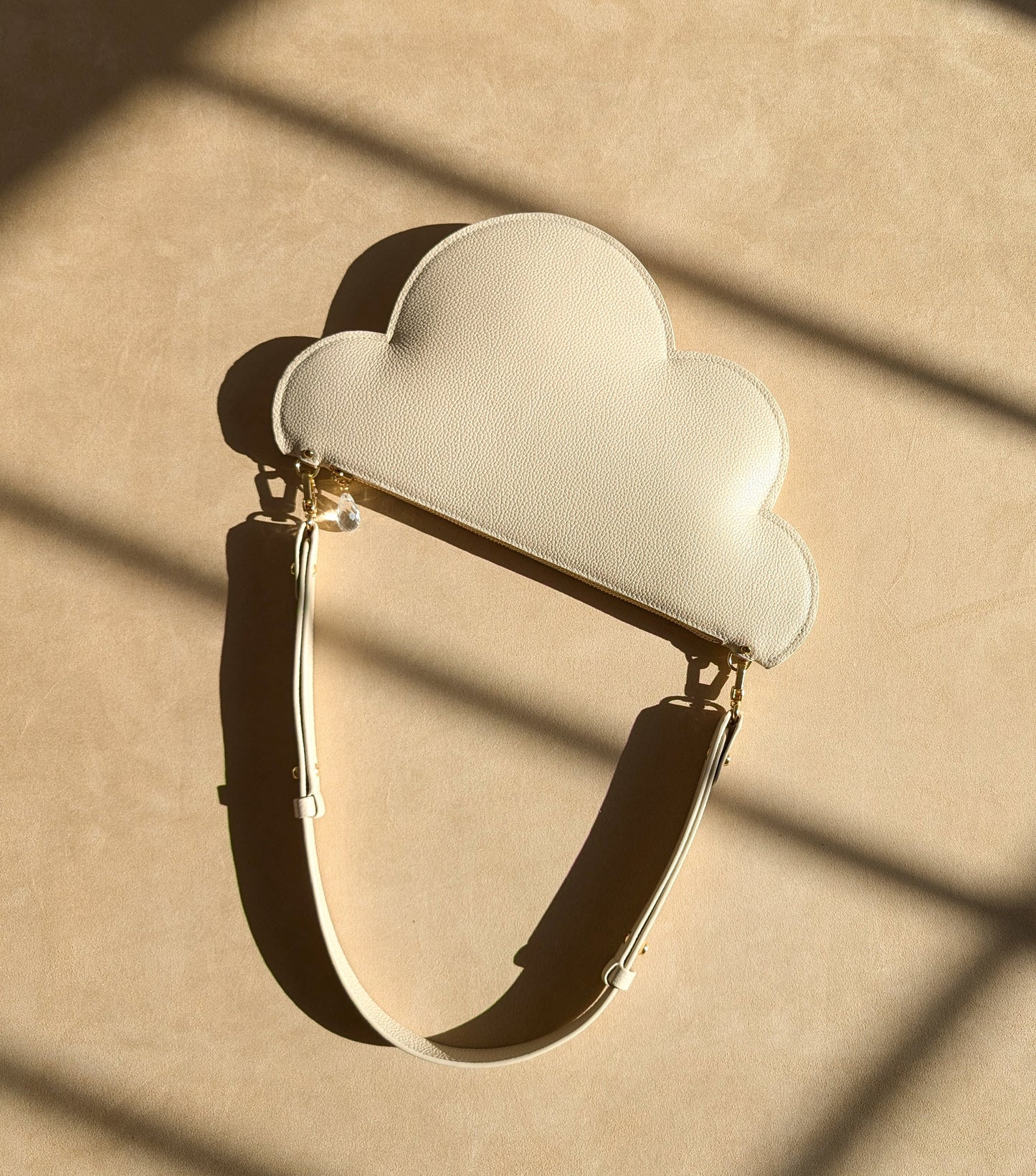 Clutch bag with removable strap in ivory