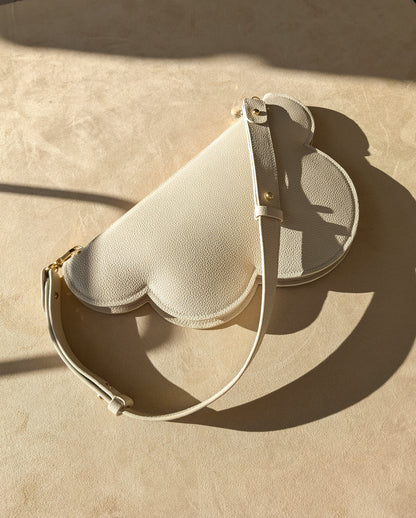 Clutch bag with removable strap in ivory